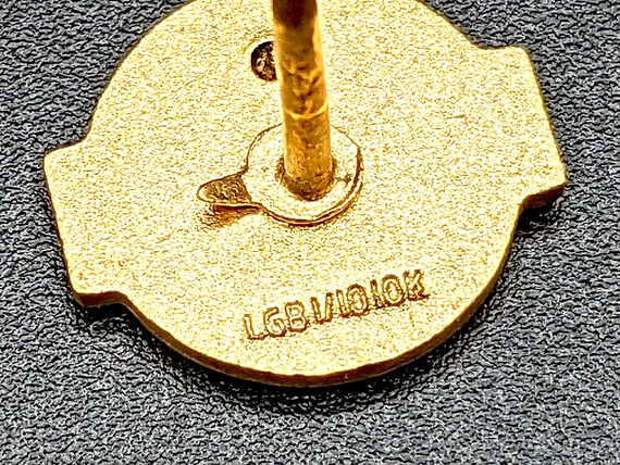 Jh stamp shop on necklace