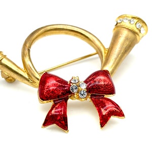 Vintage Golden Horn & Red Bow Holiday Brooch With Enamel and Rhinestones