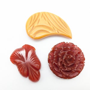 Choice of Vintage Carved Bakelite Dress Clips