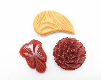 Choice of Vintage Carved Bakelite Dress Clips