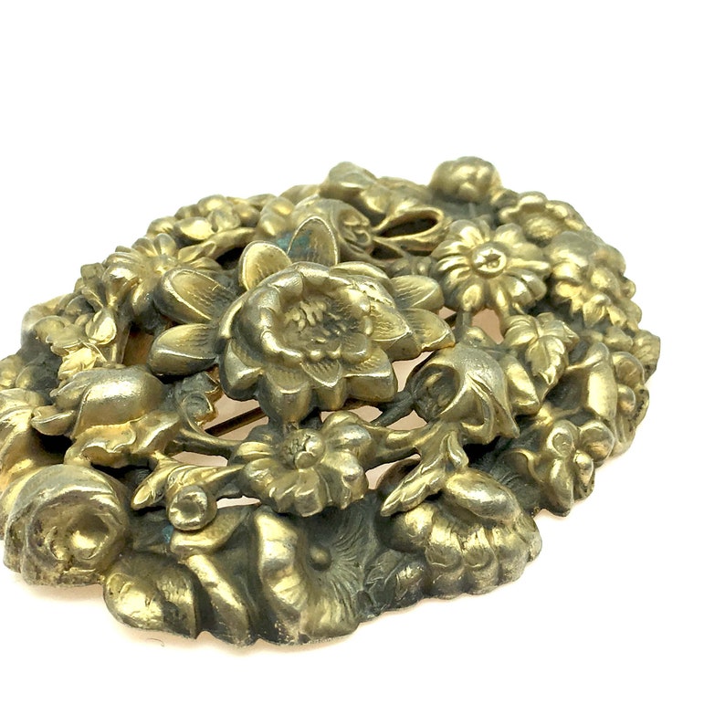 Antique Floral Pressed Brass Brooch