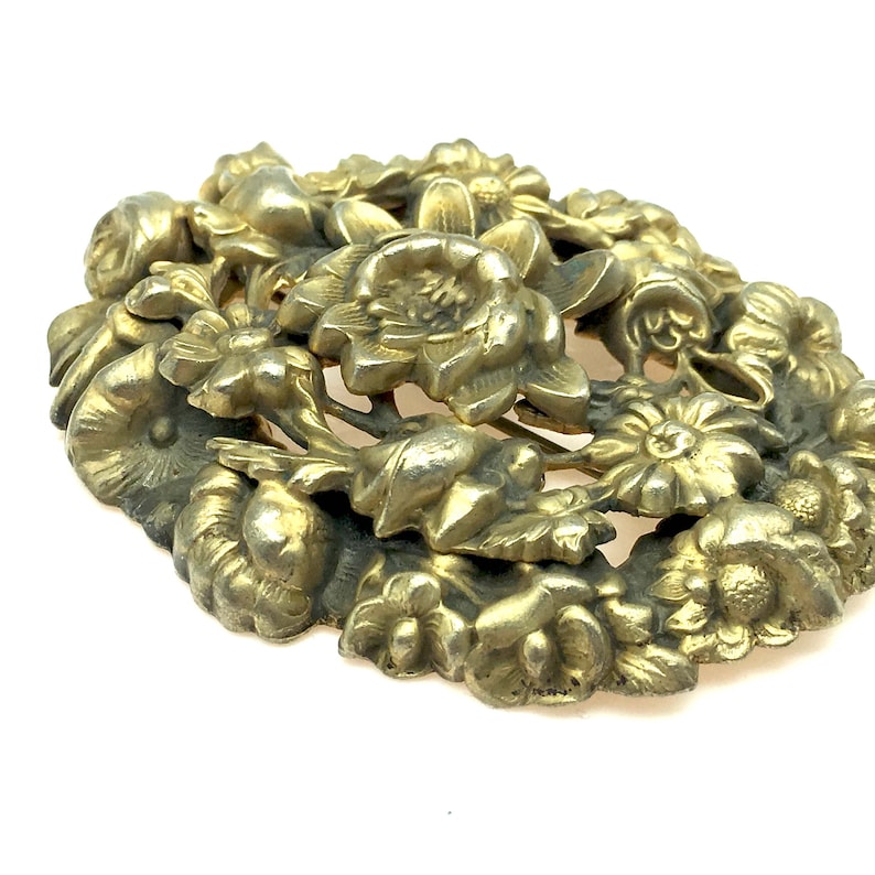 Antique Floral Pressed Brass Brooch