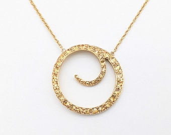 Vintage Monet Gold Tone & Rhinestone Swirled Circle Pendant Necklace - 18.5"