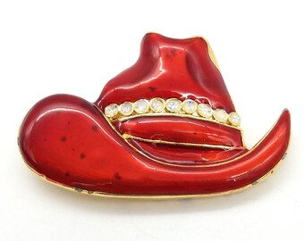 Enameled Red Cowboy Hat Brooch With Rhinestone Accent & Gold-Tone Background