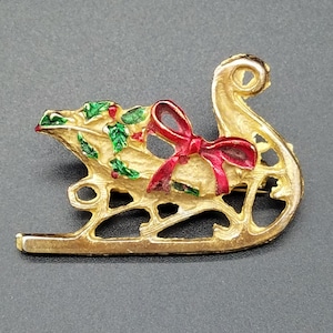 Vintage Gold Tone Christmas Sleigh Brooch with Holly and Red Bow