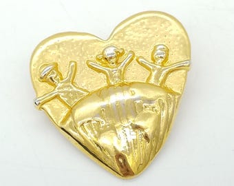 Vintage Gold-Tone Global Child Heart Brooch
