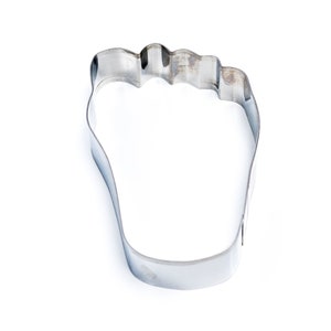 May include: A silver metal cookie cutter shaped like a foot.