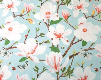 Magnolia, Organic Cotton Poplin Fabric, Birch Fabrics, White and Pink Magnolia Blossoms with butterflies, bees, ladybugs on aqua blue