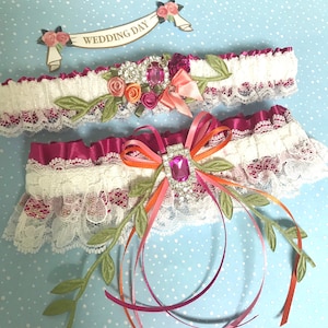 Magenta wedding garter set. Magenta orange and coral bridal garters.