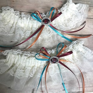 Burnt orange, teal, wine and ivory wedding garter set.