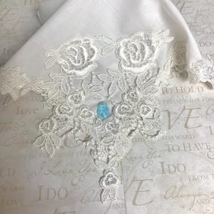 Heirloom ivory wedding hankie with something blue.