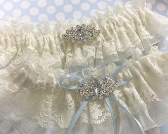 Ivory Lace Wedding Garter Set, Something Blue bows and Rhinestone centers Bridal Garters.