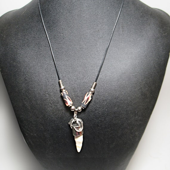Alligator tooth shop pendant