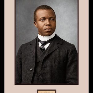 May include: A portrait of Scott Joplin wearing a dark charcoal wool suit jacket and vest over a crisp white high-collar shirt with a dark necktie. The image is framed with a light beige border and includes the signature Scott Joplin below.