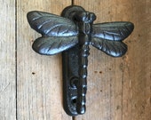 Dragonfly Door Knocker made of cast iron. This is the perfect door knocker for a cottage. Shown in the Black Gunmetal finish.