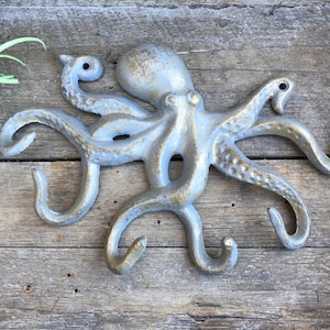 Metal Octopus Wall Hook Made of Cast Iron. This is a Fantastic Piece, Fun  and Functional Shown in the New Mercury Finish. 