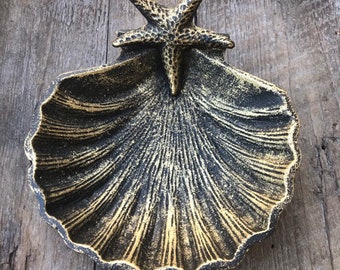 Seashell jewelry dish for your modern beach home. This cast iron sea shell is perfect for small jewelry Shown in the Burnished Gold finish.