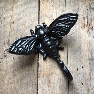 Bumble bee wall hook. Solid and sturdy made of cast iron shown in Black Gunmetal finish