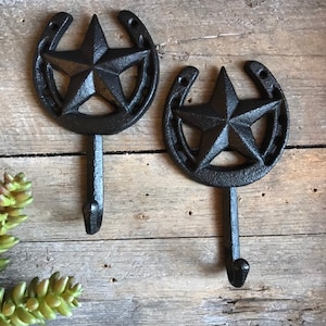 Western decor wall hook made of cast iron. Solid and sturdy built to last.