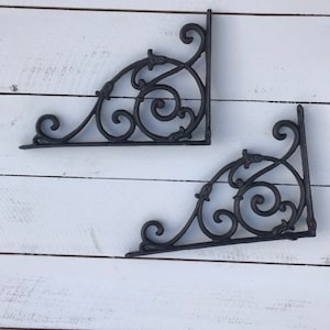Ornate iron shelf bracket
