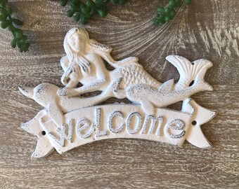 Cast Iron Beach Welcome Sign with mermaid and dolphins.  Made of solid cast iron.