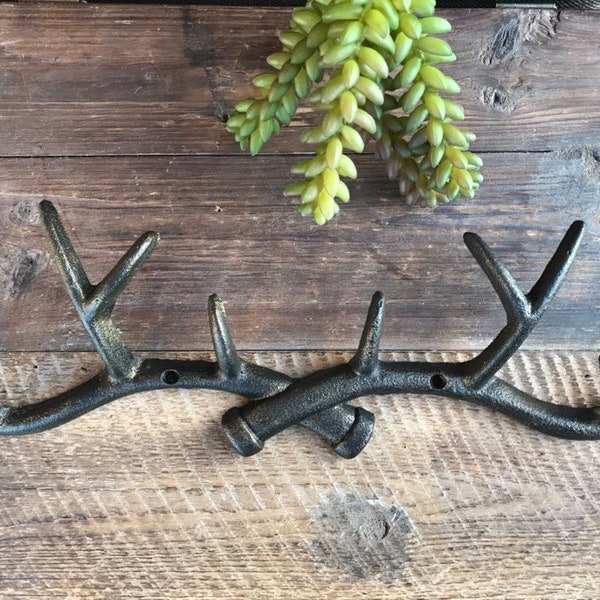 Deer antler key hooks shown in the old copper finish.