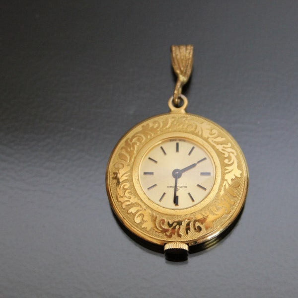 Pendentif montre suisse BUCHERER vintage, plaqué or jaune. Vent manuel.