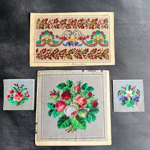 May include: A collection of vintage needlepoint patterns featuring floral and ornamental designs. The patterns include a large floral bouquet, a decorative border, and two smaller floral arrangements, all in vibrant colors.