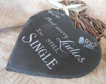 Don't worry ladies I'm still SINGLE , Our bespoke handmade  22cm heart shaped slate wedding sign makes the perfect prop for a pageboy