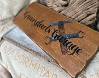 Grandads Garage sign decorated with tools
