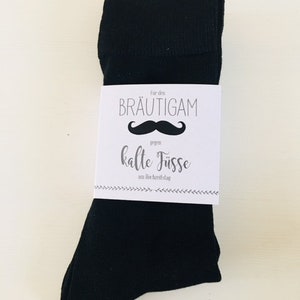 Socks with banderole groom against cold feet