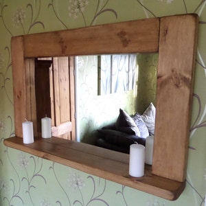 Hand made chunky bespoke rustic solid mirror with candle shelf made to order