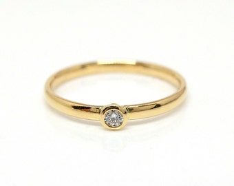 Gold engagement ring with 0.05ct diamond in 750/ 18K gold in closed setting, goldsmith diamond ring for women from Berlin