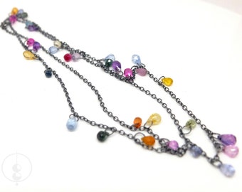 Colorful sapphire drop necklace made of blackened silver, 70 cm long chain with 32 gemstone drops in yellow, orange, green, light blue, pink and purple