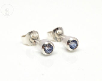 Silver stud earrings with light blue sapphires, small silver earrings with blue gemstones, simple earrings by goldsmith