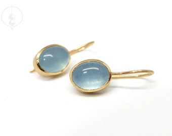 Gold earrings with light blue aquamarines, gold earrings with oval blue aquamarine cabochons, handmade earrings made of 18K gold