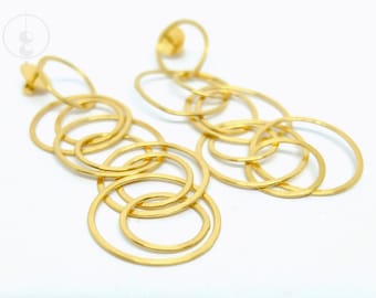 7cm long earrings with several rings in silver or plated with fine gold, handmade earrings with many forged eyelets