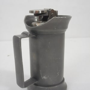 A Superb Vintage French Metal and pewter table lighter