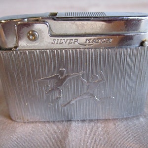 A Gorgeous Vintage Silver March Metal Lighter with Football Design/Motifs