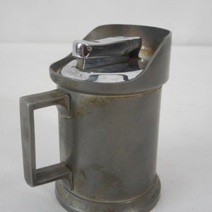 A Superb Vintage French Metal and pewter table lighter