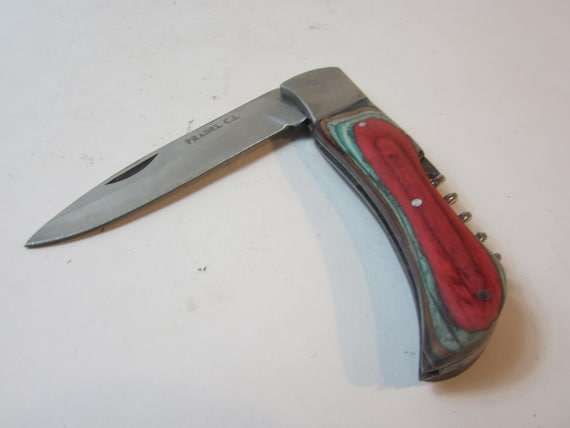 A Vintage Steel and Wooden Pradel CL Pocket/sporting/outdoor