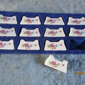 A Beautiful Set of Twelve Porcelain, Hand-Painted Knife/Fork Rests, Made in France