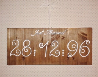 Wooden plaque handpainted with wedding date sign and "Just married".