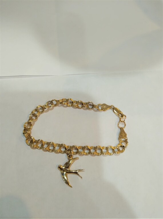 Solid 10k yellow gold Charm Bracelet with Swallow