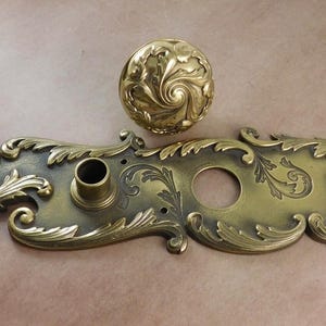 Antique Romanesque Rare Norwalk cast brass bronze entry size door knob with back plate design E-16900 vintage doorknob and backplate