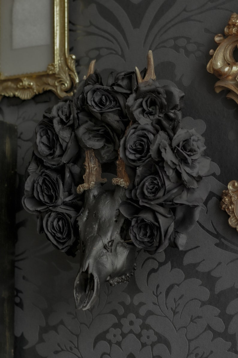 Black matte deer skull with natural antlers and black flower crown for dark or gothic gift for home decor