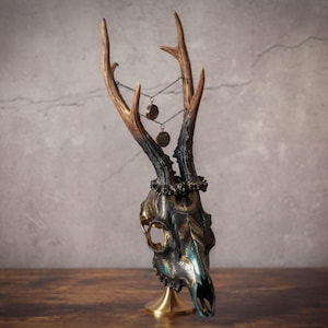 Deer skull painted dark green and gold with natural antlers, chain and crystals for voodoo, forest core, alternative or gothic home decor