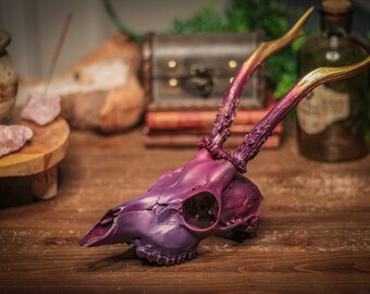 Matte dark purple, pink and gold painted skull with natural antlers decorated, unique goth decor, for gothic home decor
