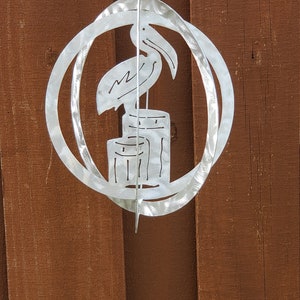 10&quot; Aluminum Pelican Wind Spinner, yard art,  Gift, Nautical theme, ocean animals and fish, beachy. Looks beautiful spinning in sunlight.
