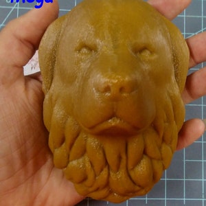 May include: A brown 3D printed dog head sculpture with a detailed face and a fluffy beard.